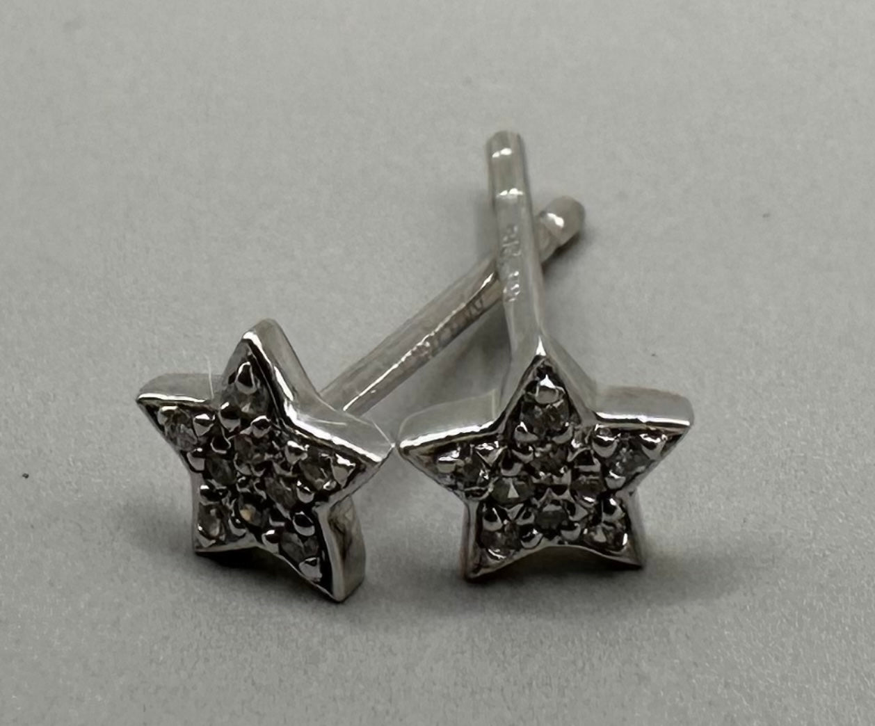 Star Shaped Diamond Studded White Gold Earrings