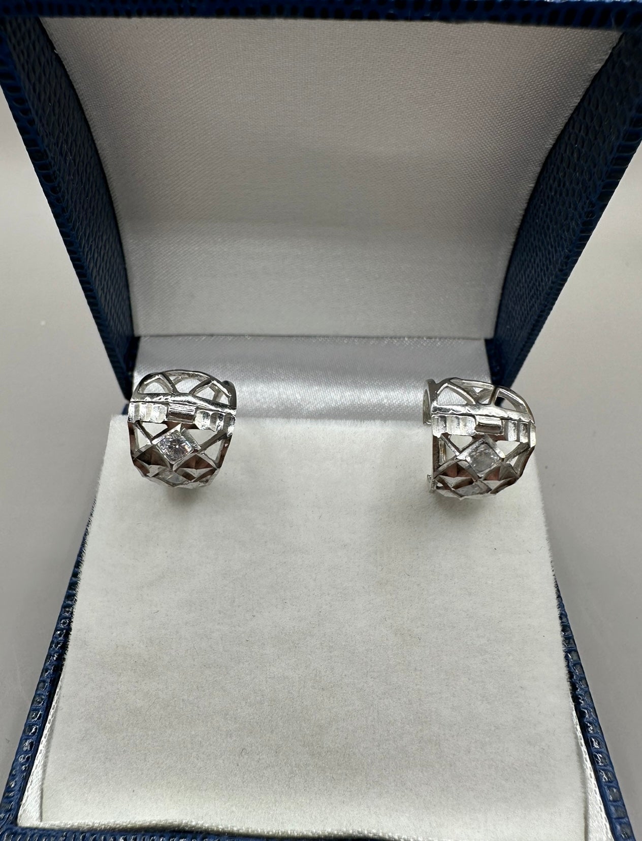 Diamond Cut White Gold Huggie Earrings