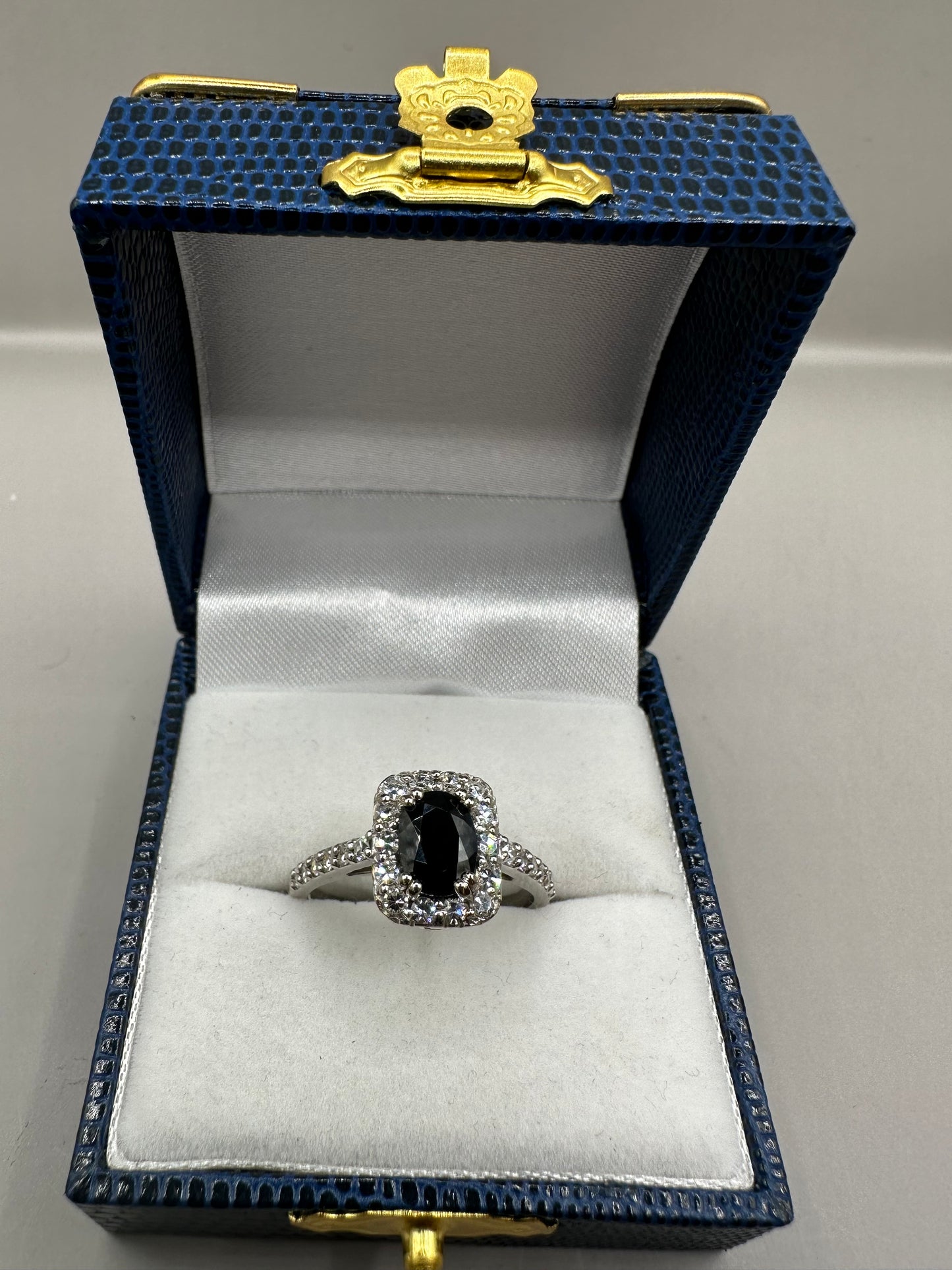 Halo Sapphire and Diamond White Gold Ring