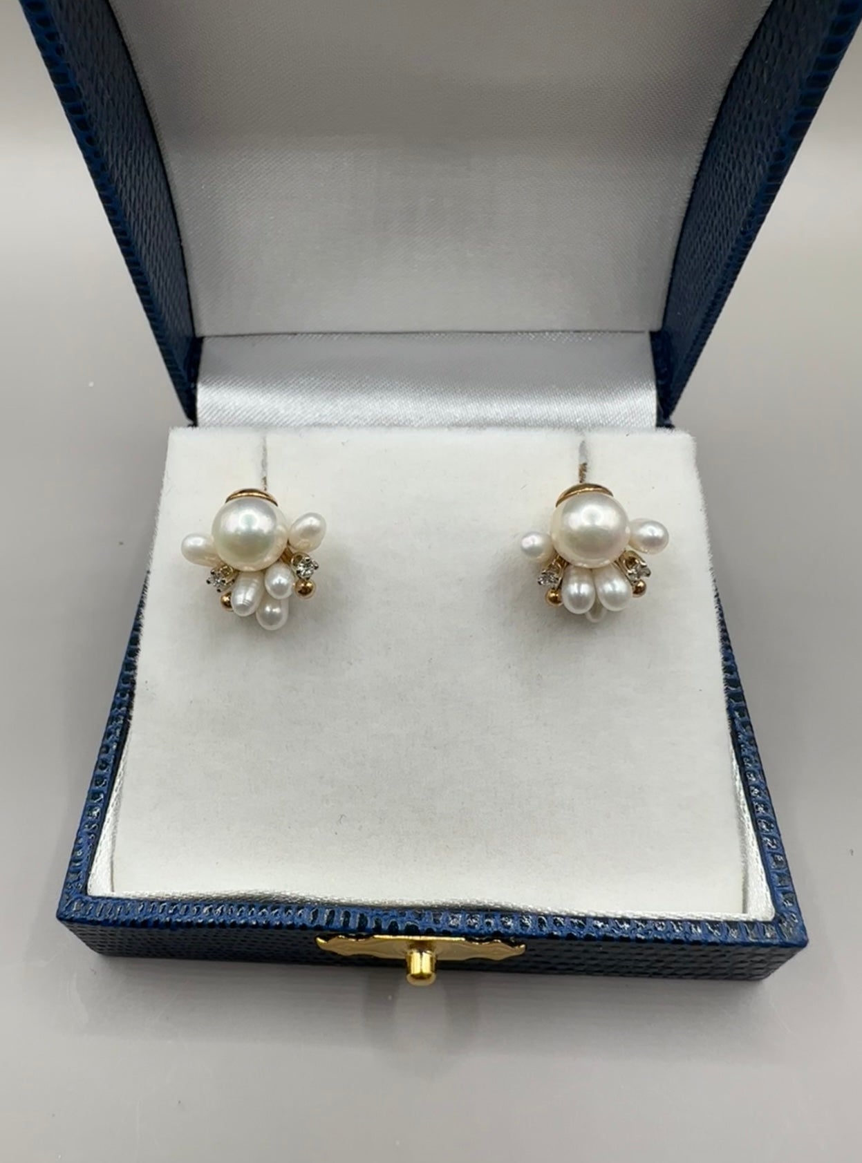 Cluster of Pearl and Diamond Studded Yellow Gold Earrings